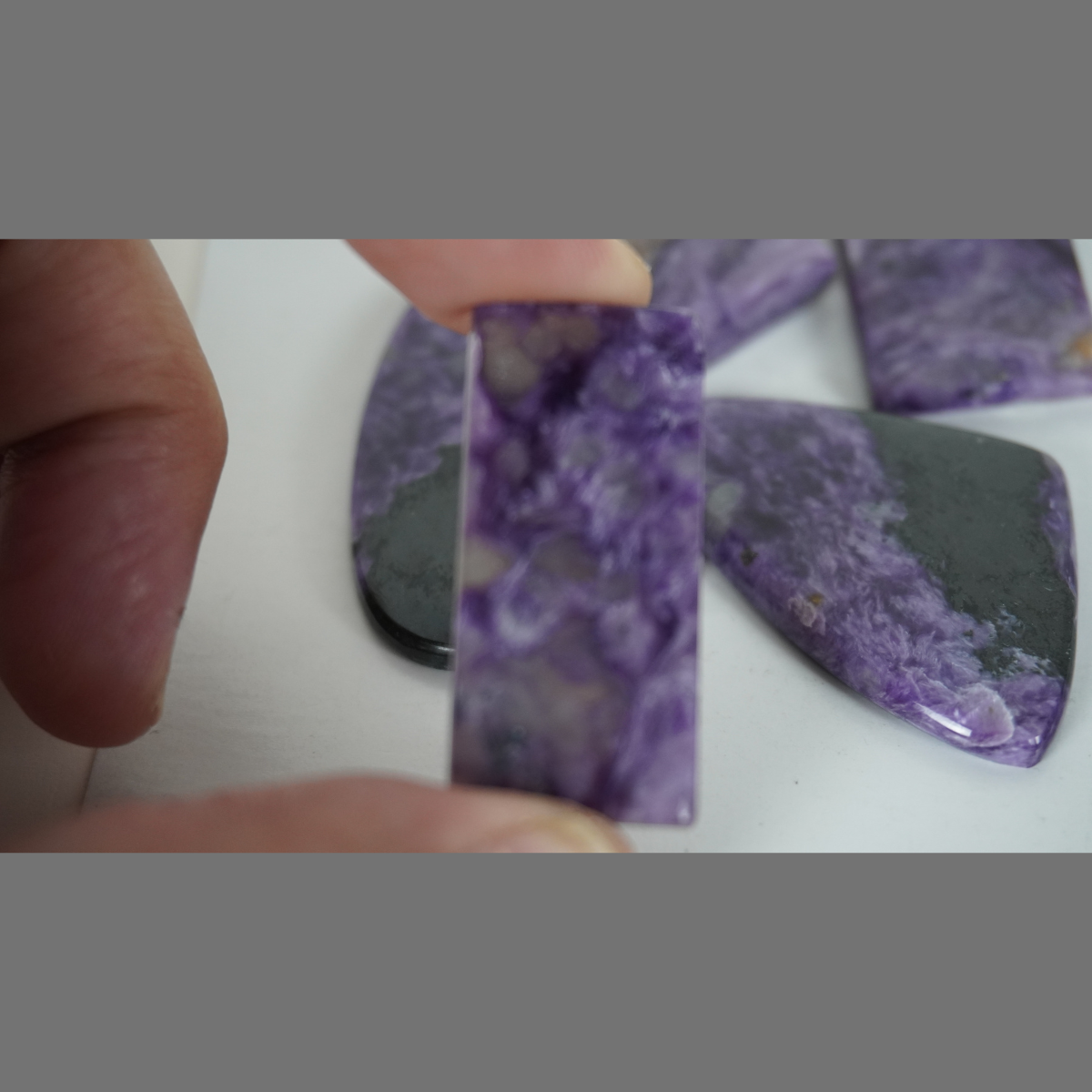 Charoite cabochons