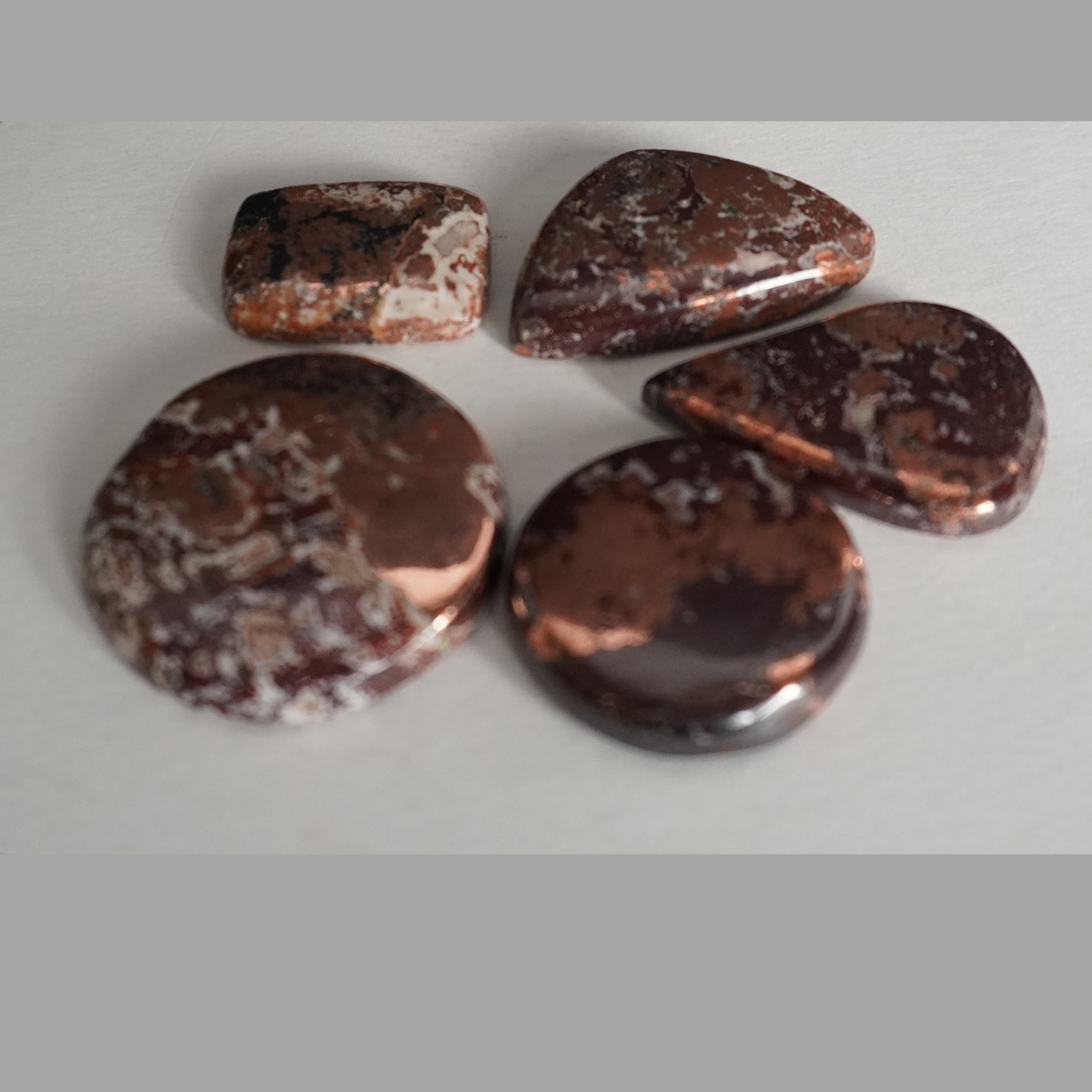 Caledonite cabochons