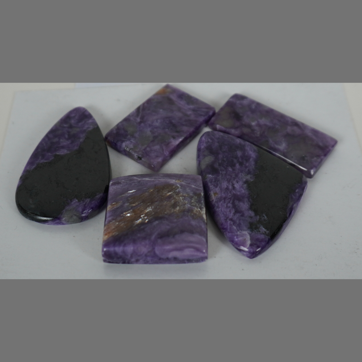 Charoite cabochons
