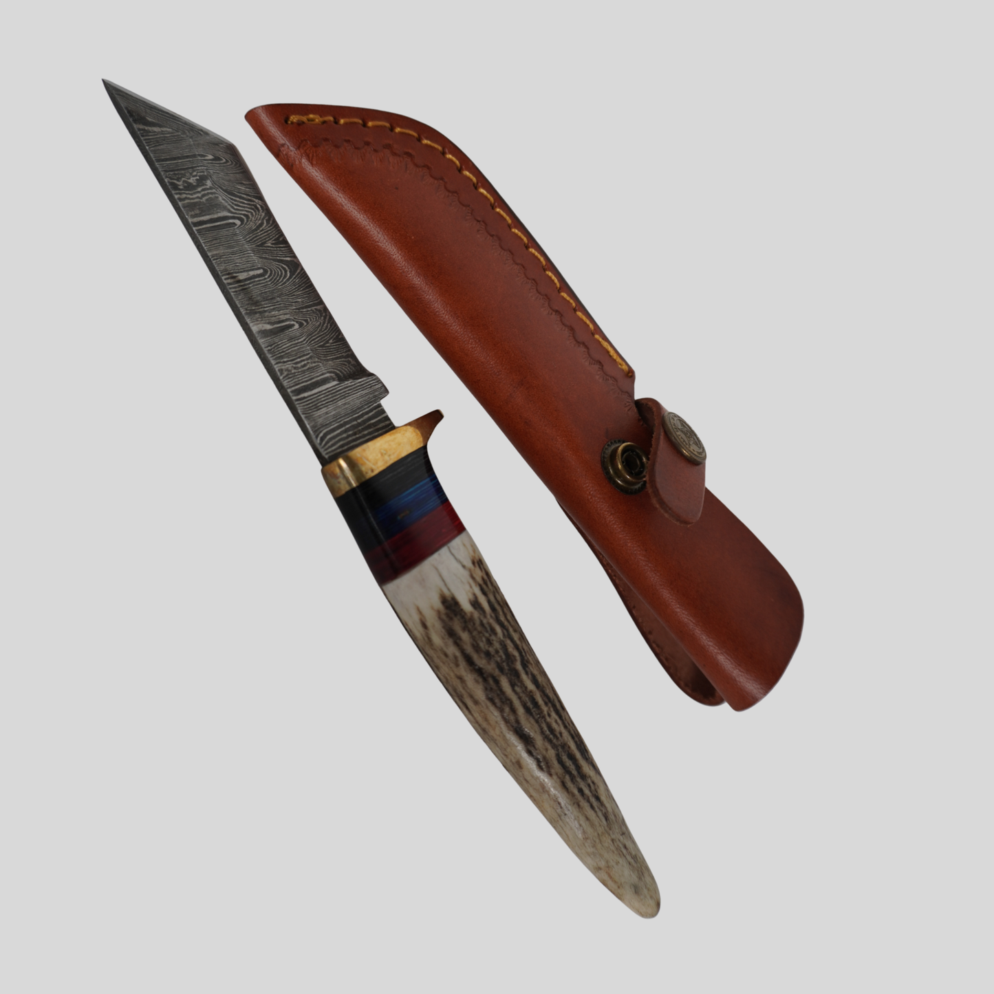 Handmade Damascus steel fixed blade knife with deer horn handle