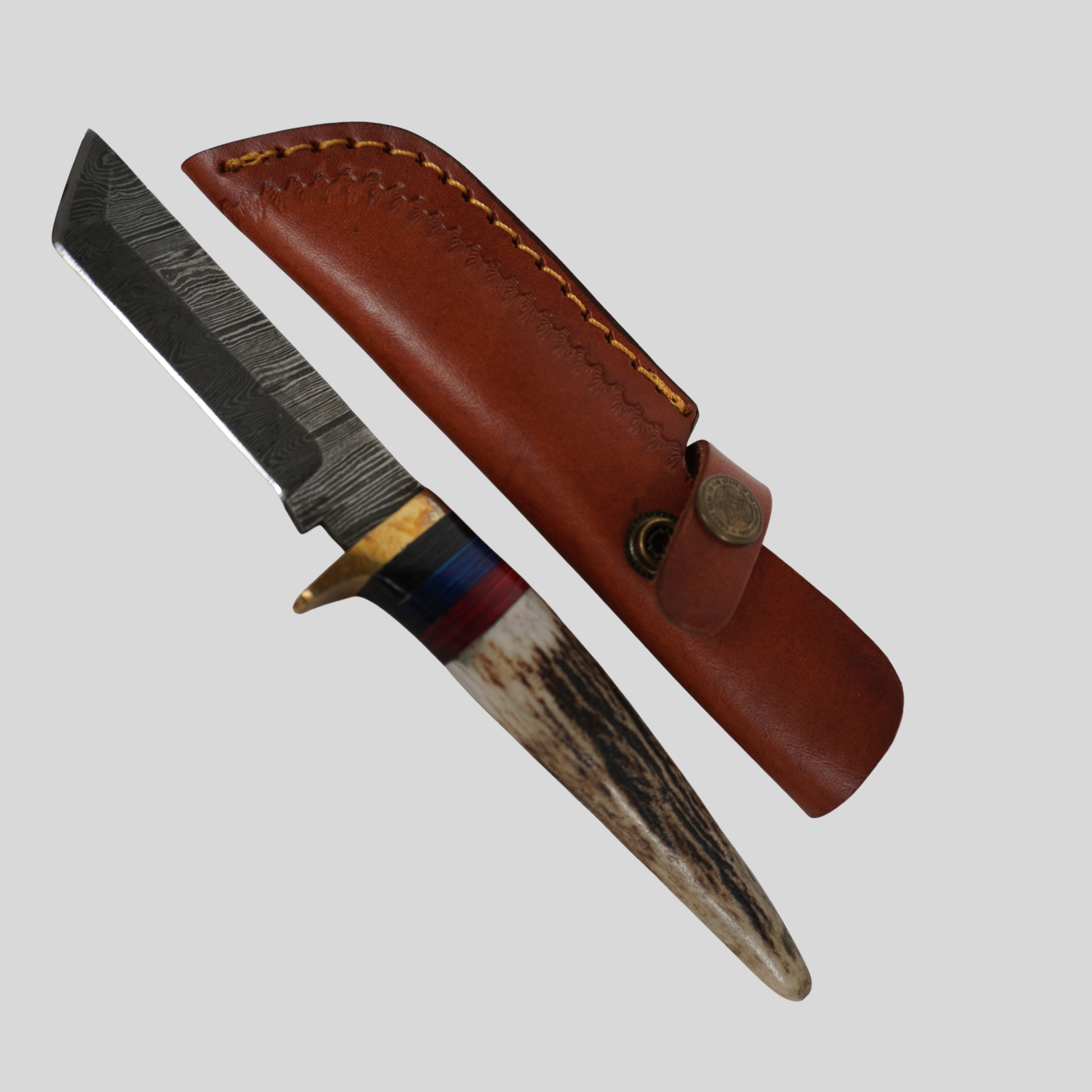 Handmade Damascus steel fixed blade knife with deer horn handle