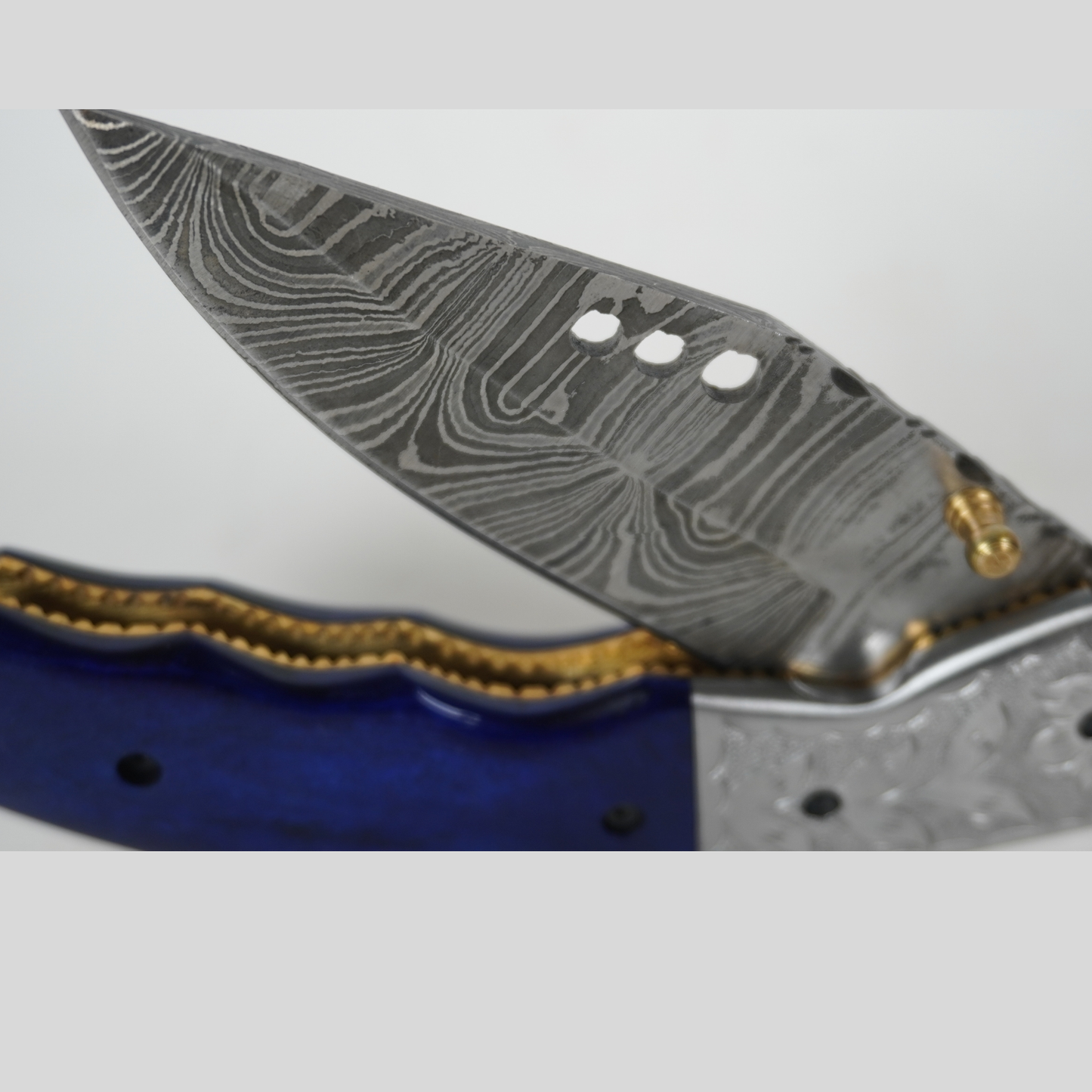 handmade damascus folding knife