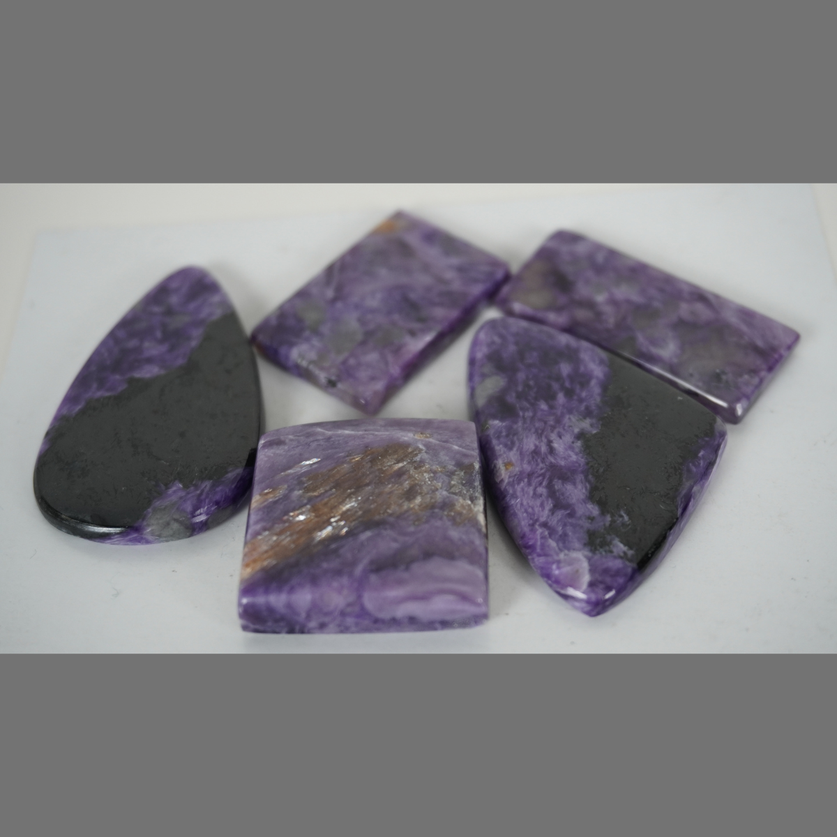 Charoite cabochons