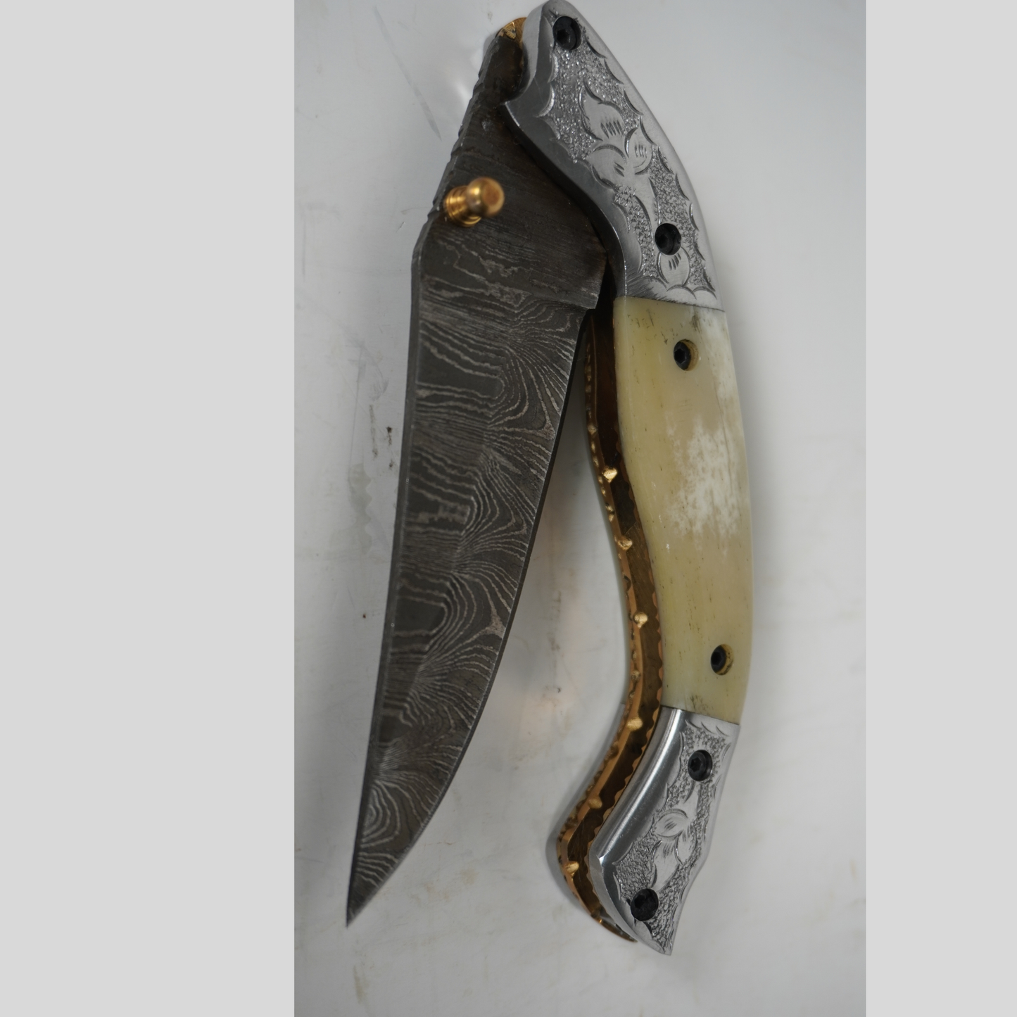 handmade damascus folding knife