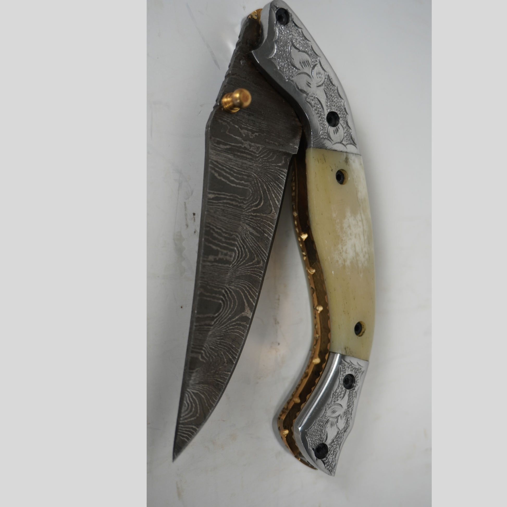 handmade damascus folding knife