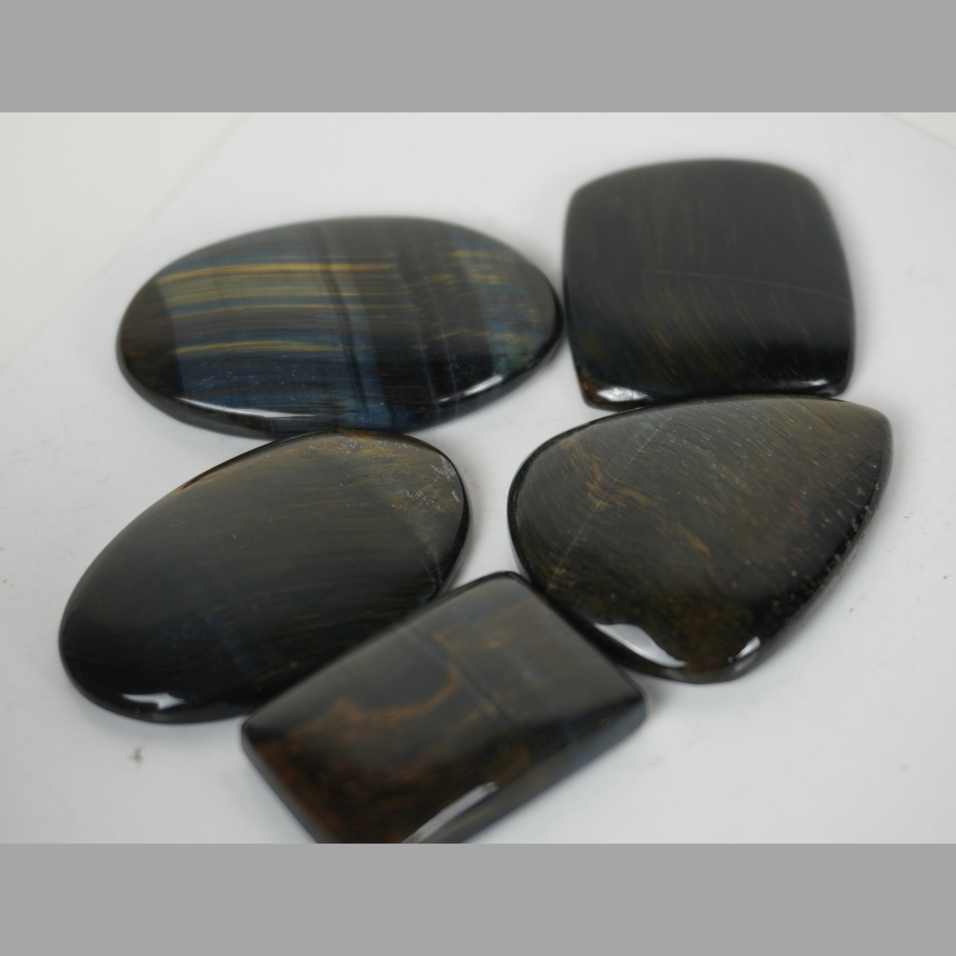 Hawk’s Eye cabochons