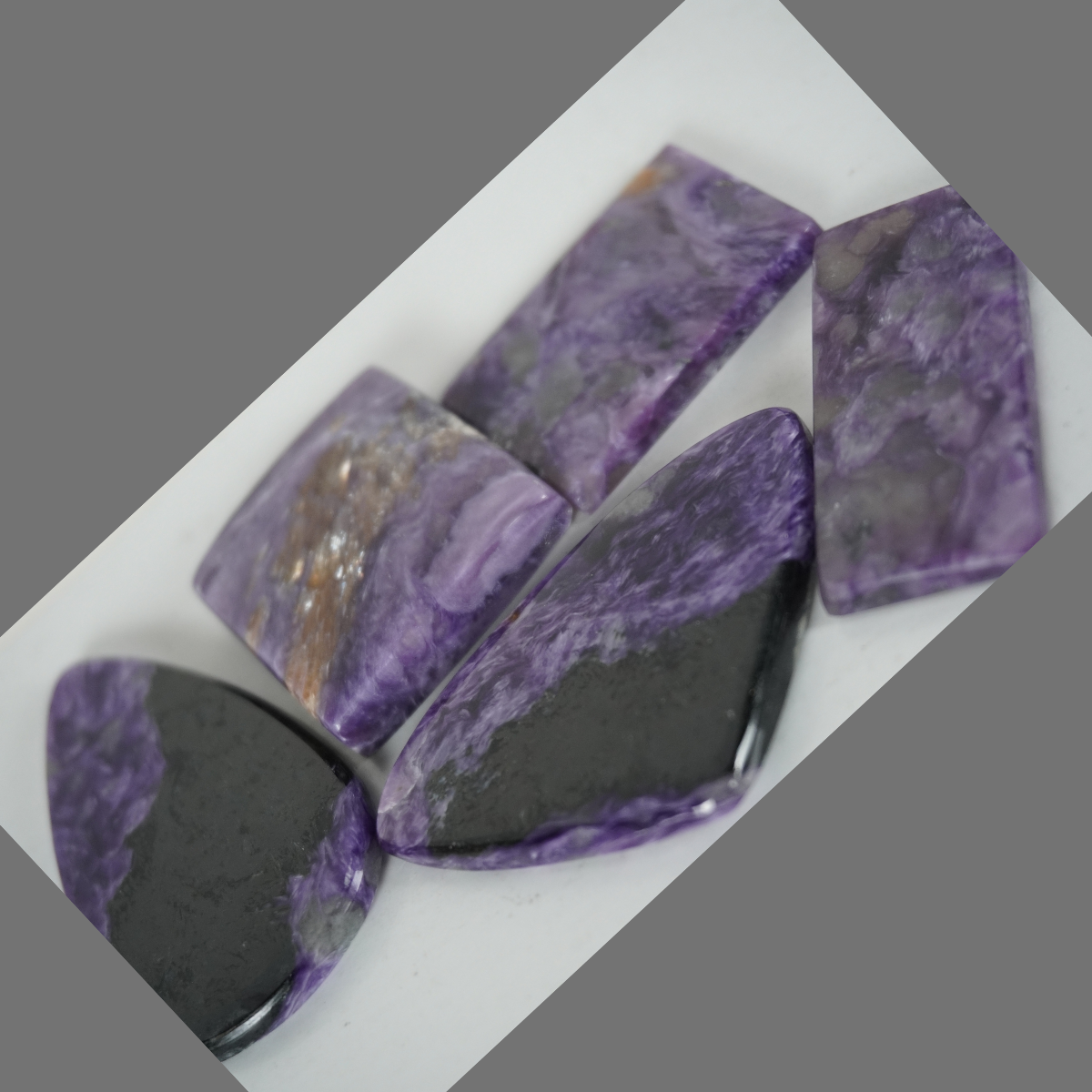 Charoite cabochons