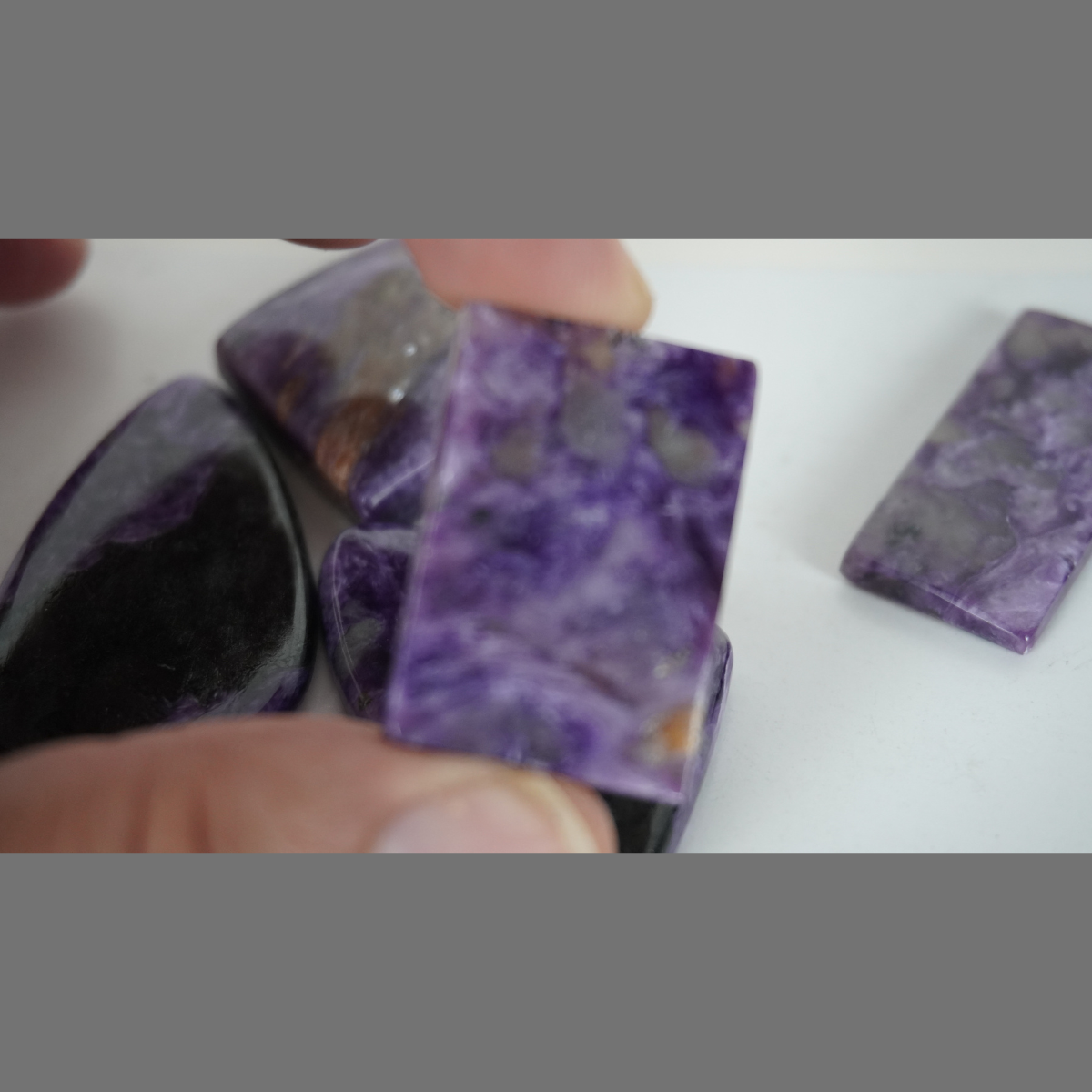 Charoite cabochons